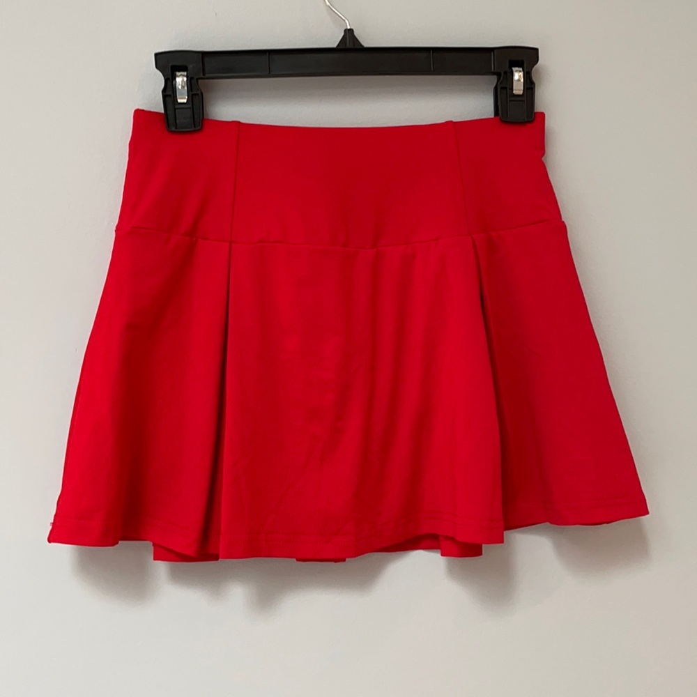 New red tennis skort with pleats